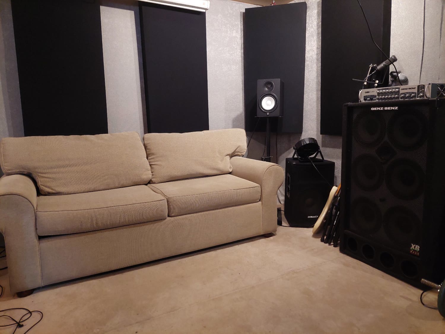 The Snedlab: couch, studio monitor, acoustic panels and a Genz Benz bass rig